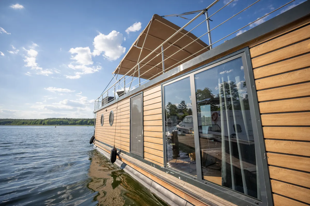 Exterior view of Brino, a Woma D13 motorboat at Fürstenberg, Germany