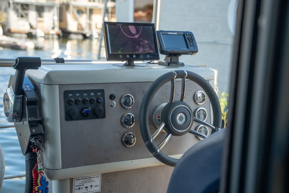 Cockpit of Brino, a Woma D13 motorboat at Fürstenberg, Germany