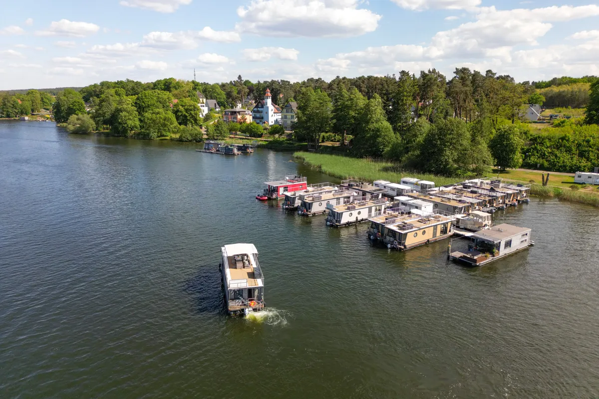 Exterior view of Brino, a Woma D13 motorboat at Fürstenberg, Germany