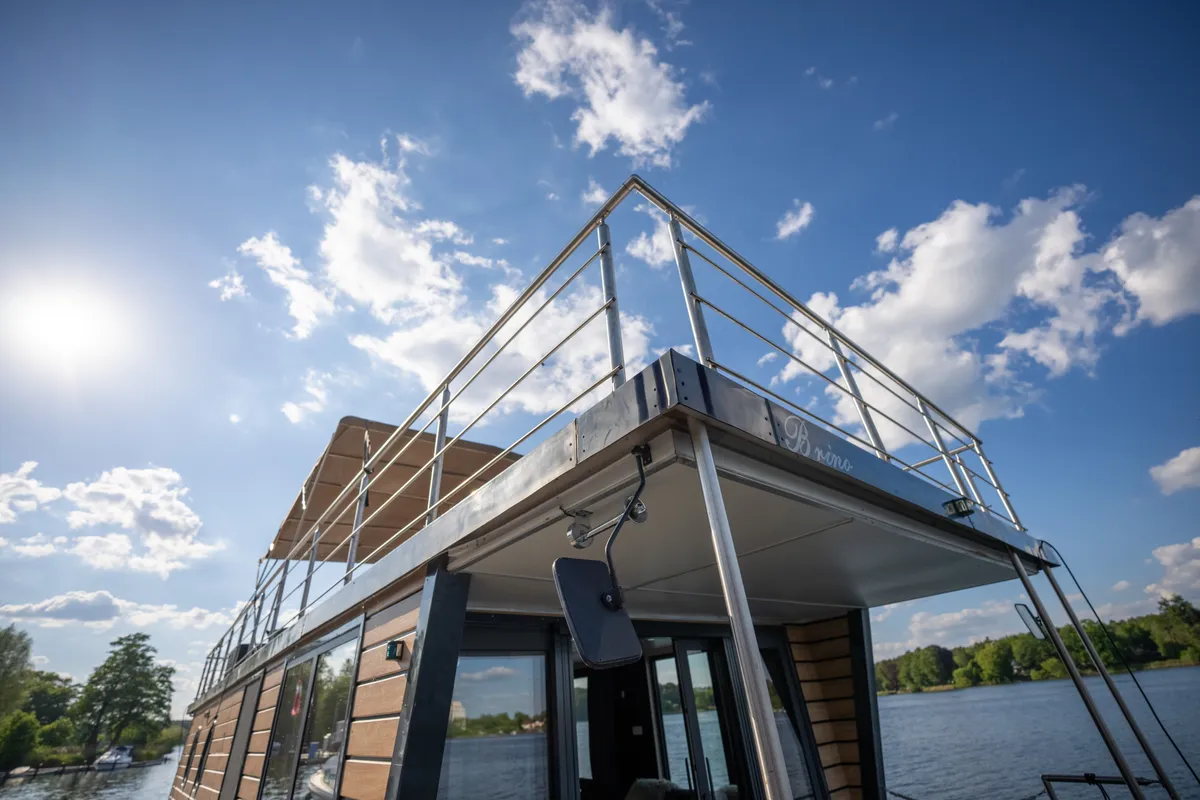 Exterior view of Brino, a Woma D13 motorboat at Fürstenberg, Germany