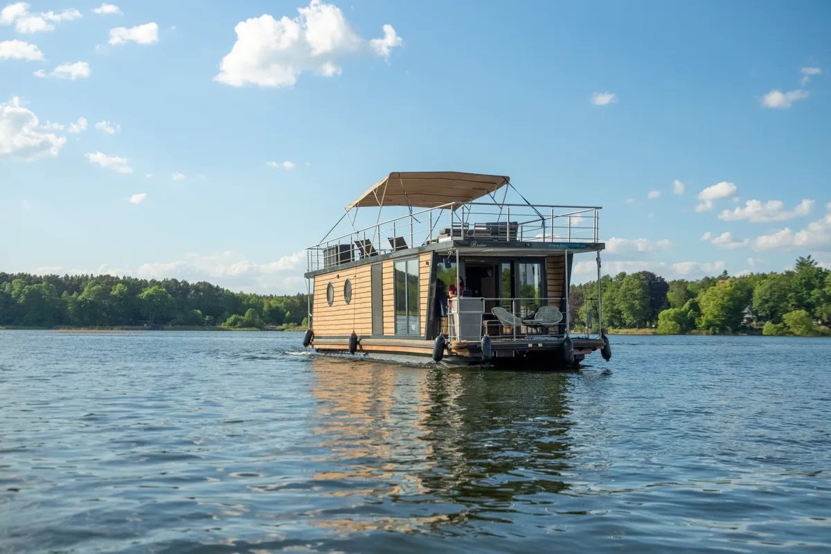 Exterior view of Brino, a Woma D13 motorboat at Fürstenberg, Germany
