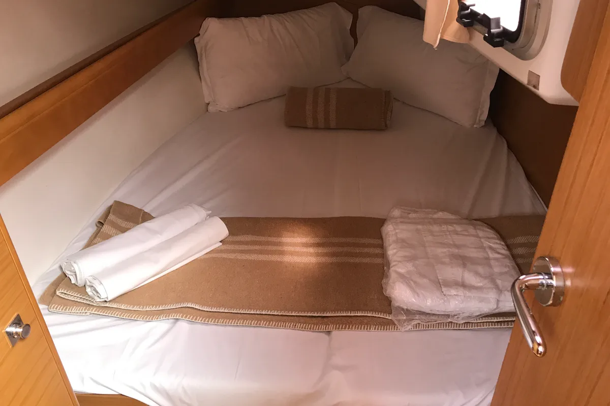 Cabin on Lyra, a Jeanneau Sun Odyssey 36i sailboat at Olbia, Italy