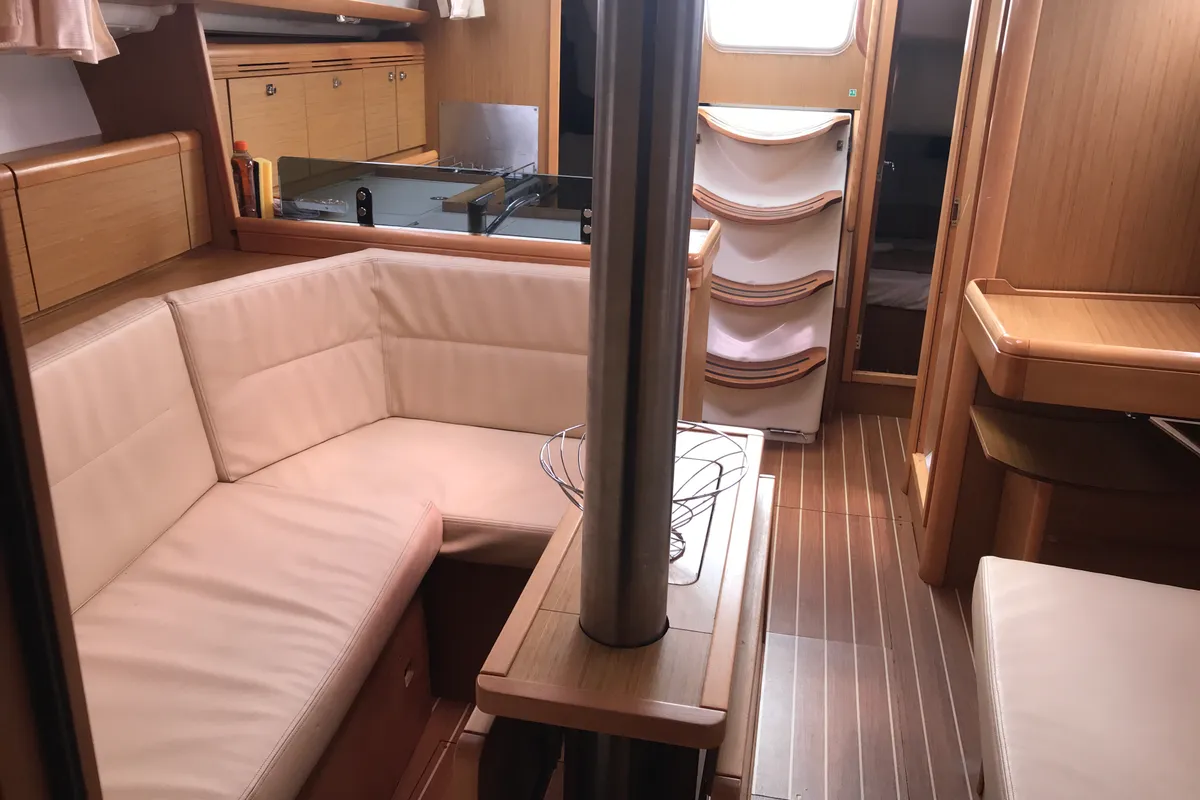 Salon of Lyra, a Jeanneau Sun Odyssey 36i sailboat at Olbia, Italy