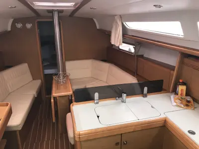 Salon of Lyra, a Jeanneau Sun Odyssey 36i sailboat at Olbia, Italy