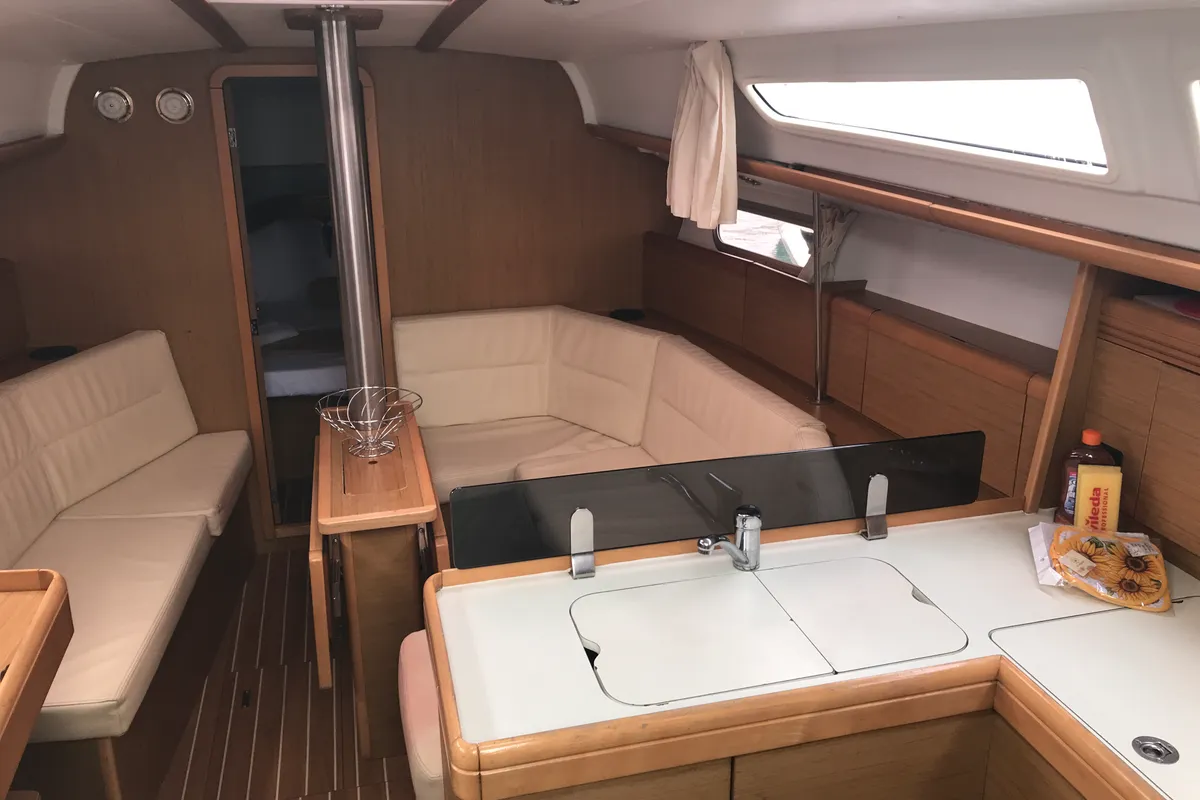 Salon of Lyra, a Jeanneau Sun Odyssey 36i sailboat at Olbia, Italy