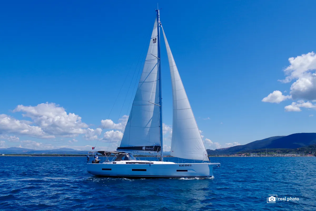Exterior view of Agnese - Water maker, Solar Panel, a Dufour 530 sailboat at Puntone di Scarlino, Italy
