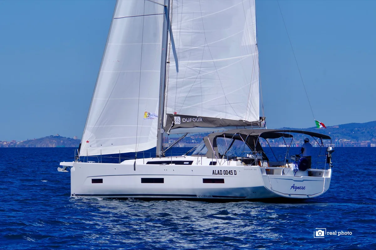Exterior view of Agnese - Water maker, Solar Panel, a Dufour 530 sailboat at Puntone di Scarlino, Italy