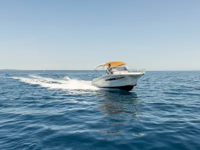 Exterior view of 275322ML, a Atlantic Marine Sun Cruiser 690 motorboat at Mali Lošinj, Croatia