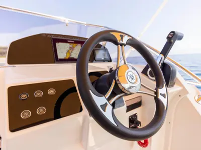 Cockpit of 275322ML, a Atlantic Marine Sun Cruiser 690 motorboat at Mali Lošinj, Croatia
