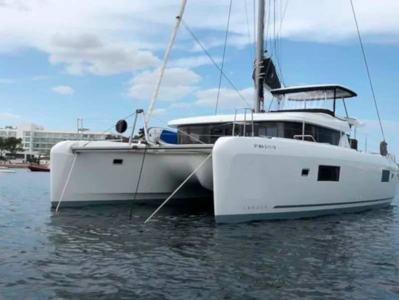 Exterior view of Side, a Lagoon 42 catamaran at Sant Antoni de Portmany, Spain
