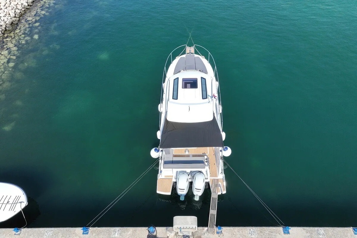 Exterior view of Freeya, a Beneteau Antares 9 OB motorboat at Grad Biograd na Moru, Croatia