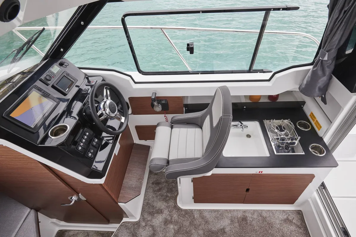 Cockpit of Merry Fisher, a Jeanneau Merry Fisher 795 motorboat at Grad Vodice, Croatia