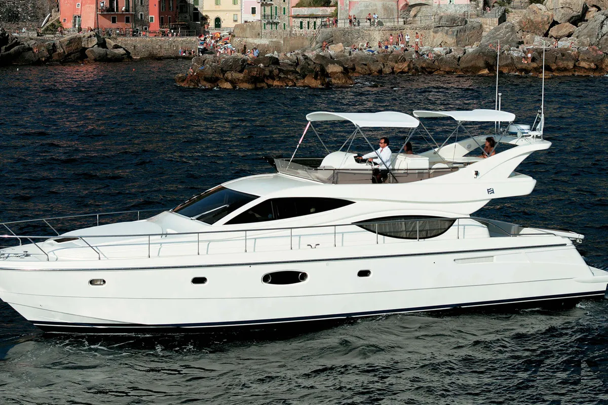 Exterior view of The Boat, a Ferretti 550 motor yacht at Panaji, India