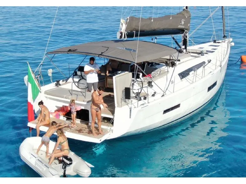 Exterior view of Cavaliere, a Dufour 56 Exclusive sailboat at Capo d'Orlando, Italy