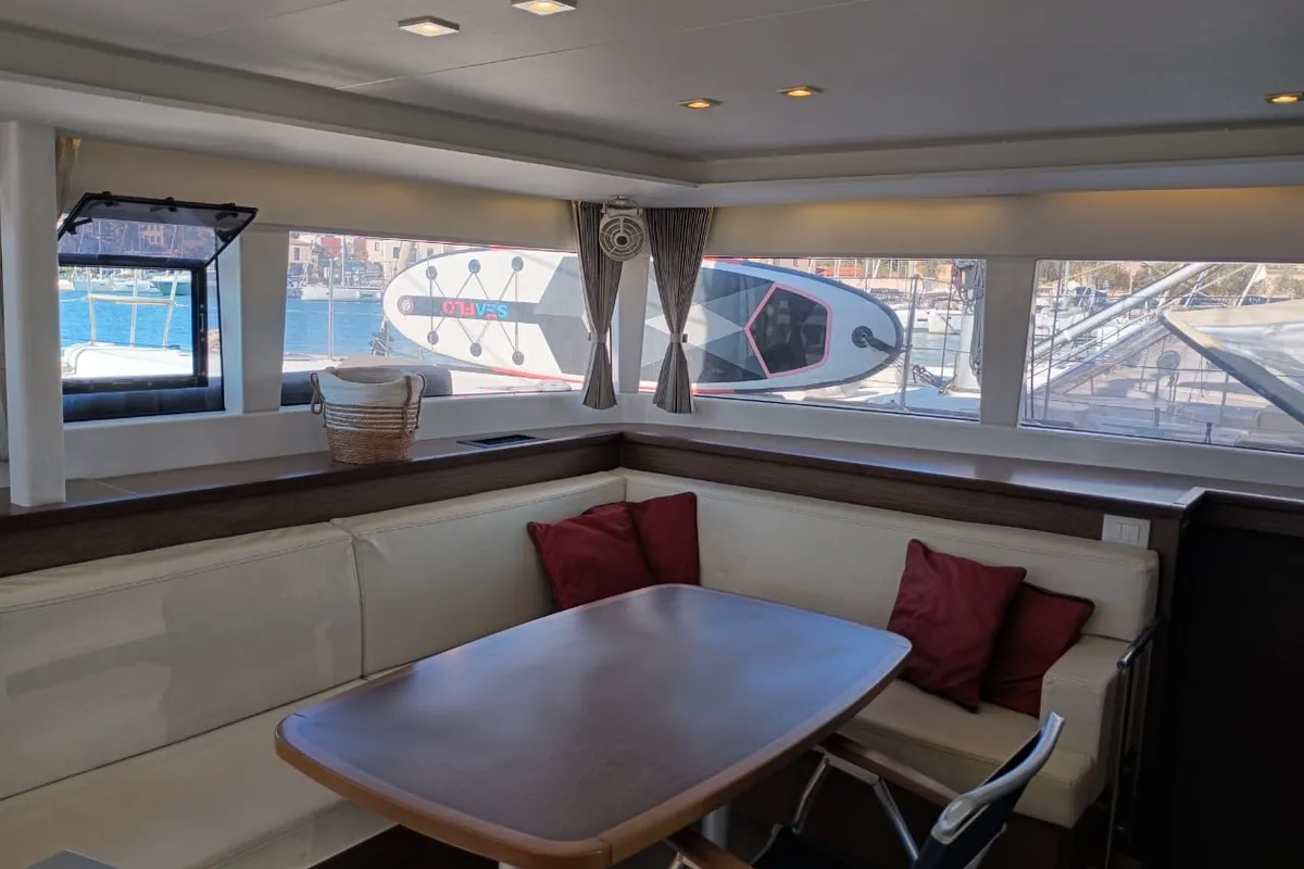 Salon of FO'S, a Lagoon 450 Fly catamaran at Agios Stefanos, Greece