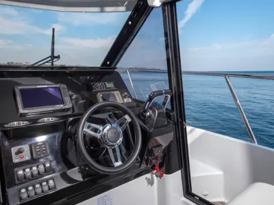 Cockpit of Dusar, a Jeanneau Merry Fisher 1095 motorboat at Cannigione, Italy
