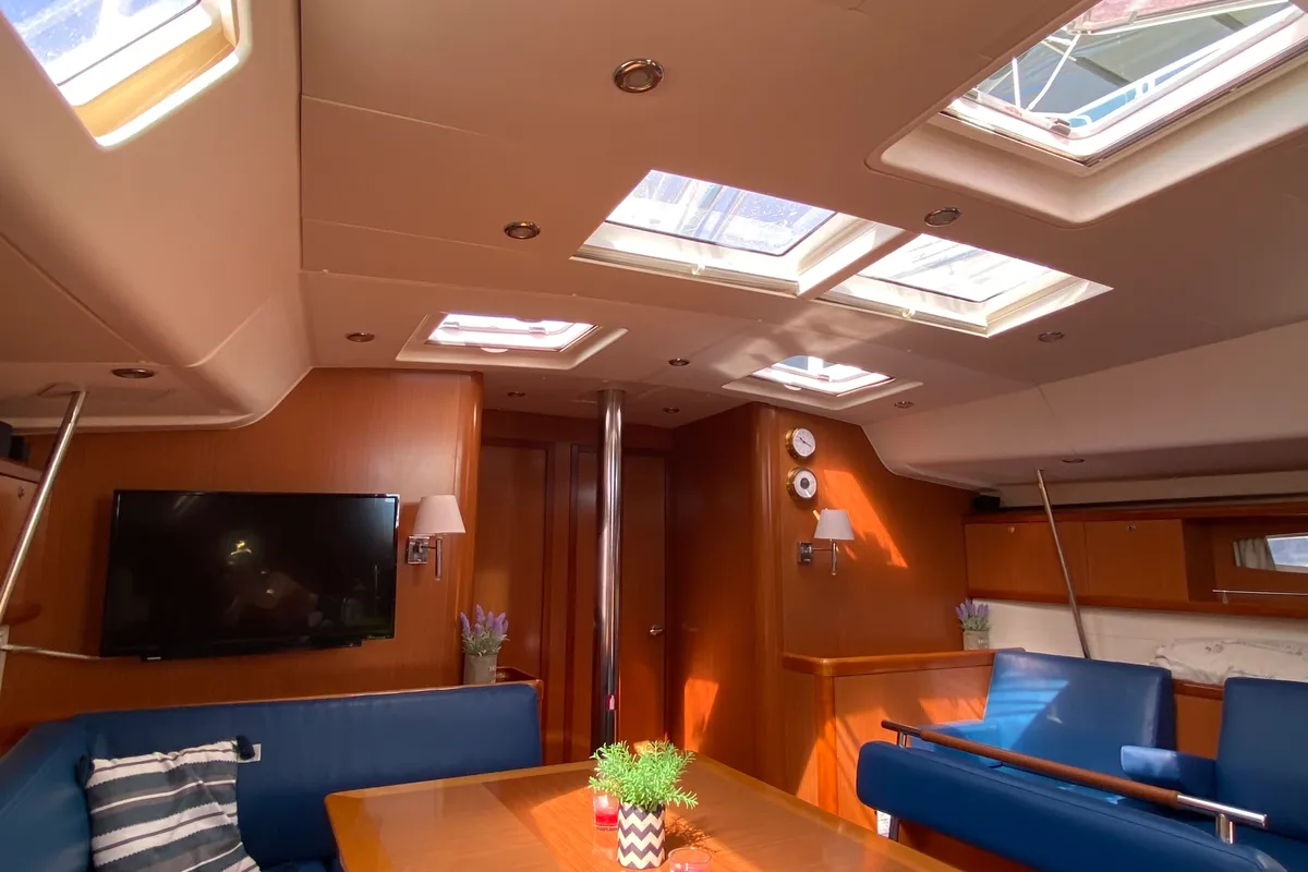 Salon of Valasia, a Beneteau Oceanis 54 sailboat at Municipal Unit of Elefsina, Greece
