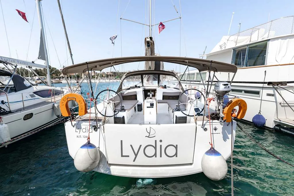 Exterior view of Lydia, a Jeanneau Sun Odyssey 490 sailboat at Lavreotiki Municipal Unit, Greece