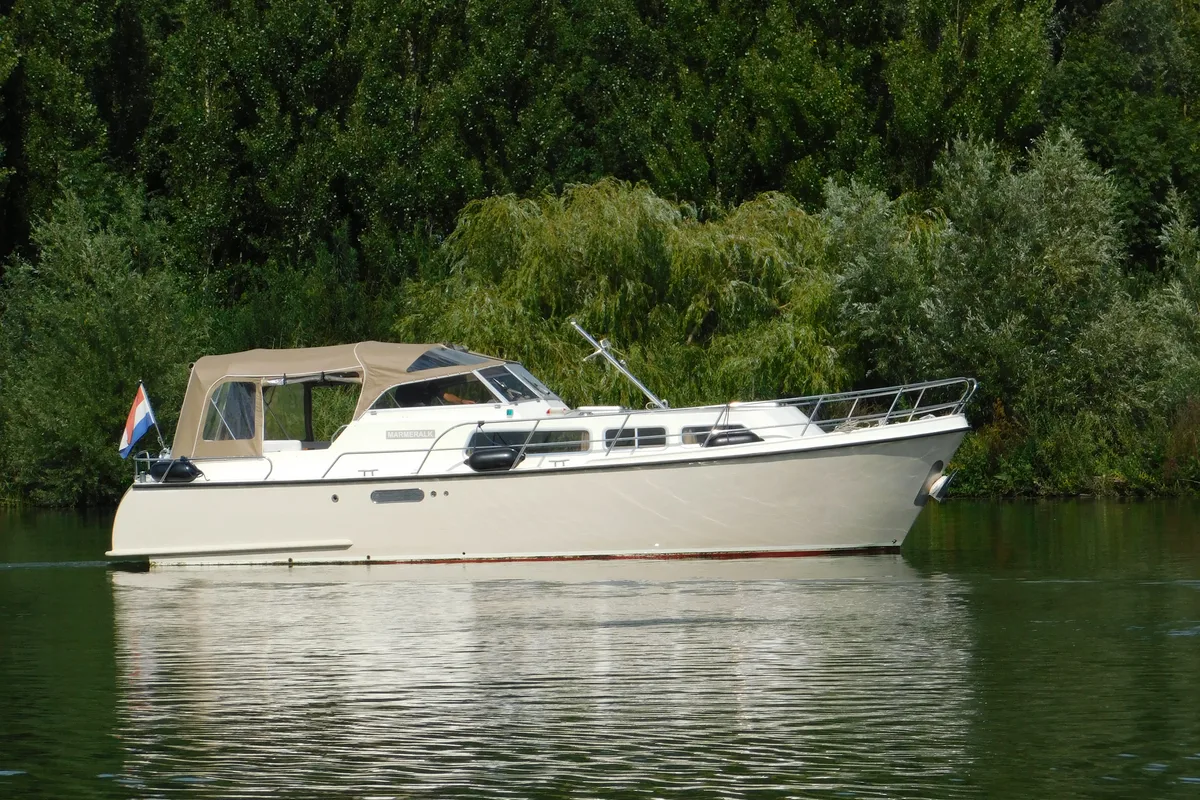 Exterior view of Marmeralk, a Delos 1100 Cruiser motorboat at IJsselstein, Netherlands