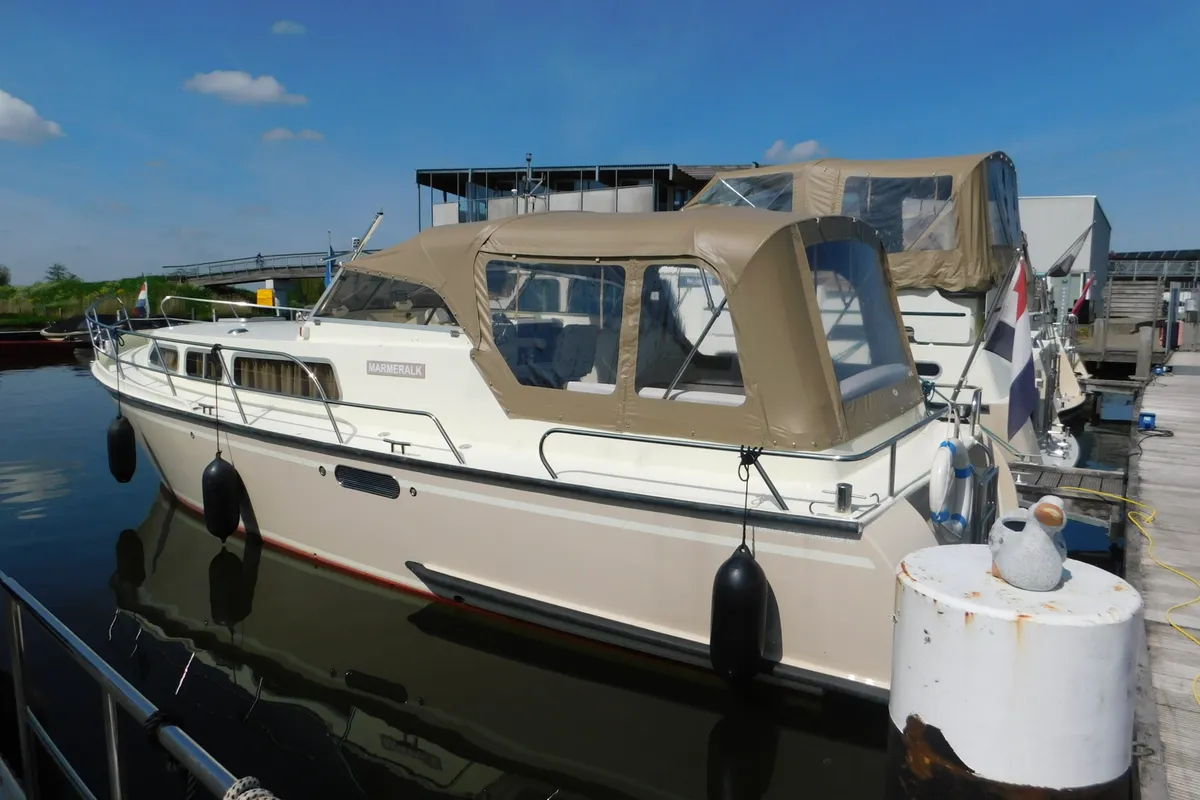 Exterior view of Marmeralk, a Delos 1100 Cruiser motorboat at IJsselstein, Netherlands