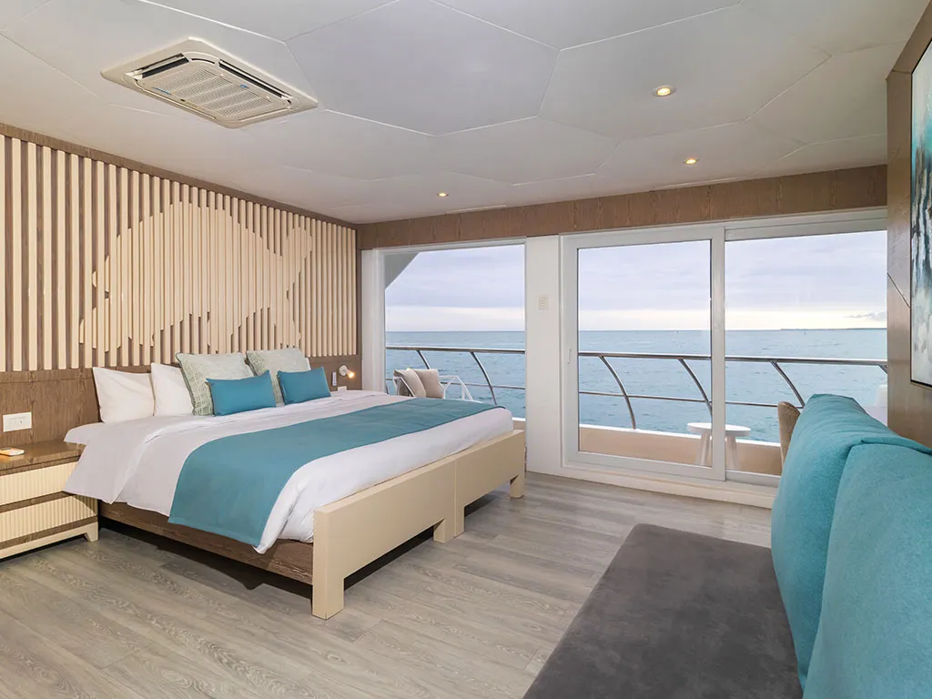 Cabin on Gulet Power Catamaran, a catamaran at Parroquia Puerto Baquerizo Moreno, Ecuador