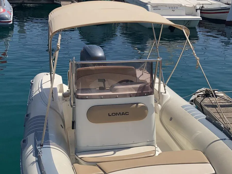 Cockpit of Fura, a Lomac Turismo 675 motorboat at Palamós, Spain