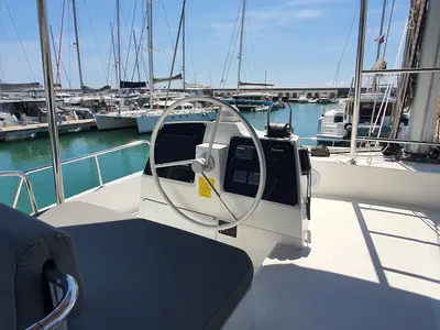 Cockpit of Nia, a Bali 4.6 catamaran at Sitges, Spain