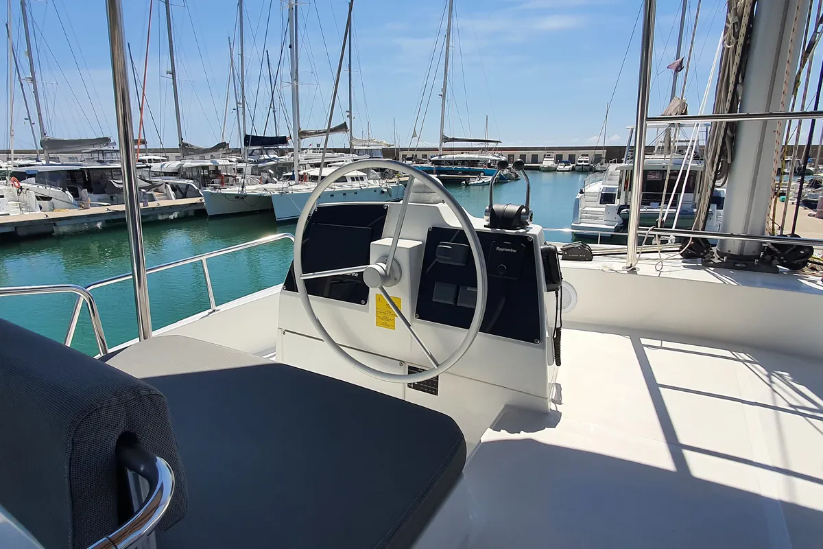 Cockpit of Nia, a Bali 4.6 catamaran at Sitges, Spain