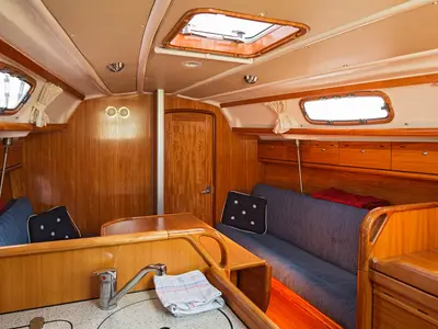 Salon of Alize, a Bavaria 30 Cruiser sailboat at Gåshaga, Sweden