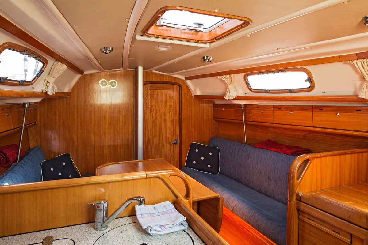Salon of Alize, a Bavaria 30 Cruiser sailboat at Gåshaga, Sweden