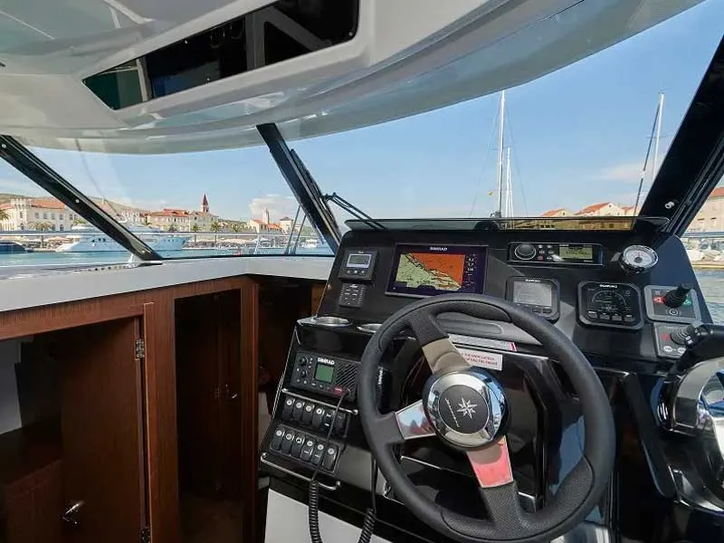 Cockpit of TG, a Jeanneau Merry Fisher 1095 FLY motorboat at Grad Trogir, Croatia