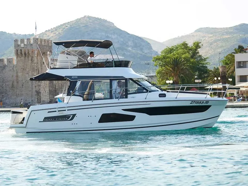 Exterior view of TG, a Jeanneau Merry Fisher 1095 FLY motorboat at Grad Trogir, Croatia