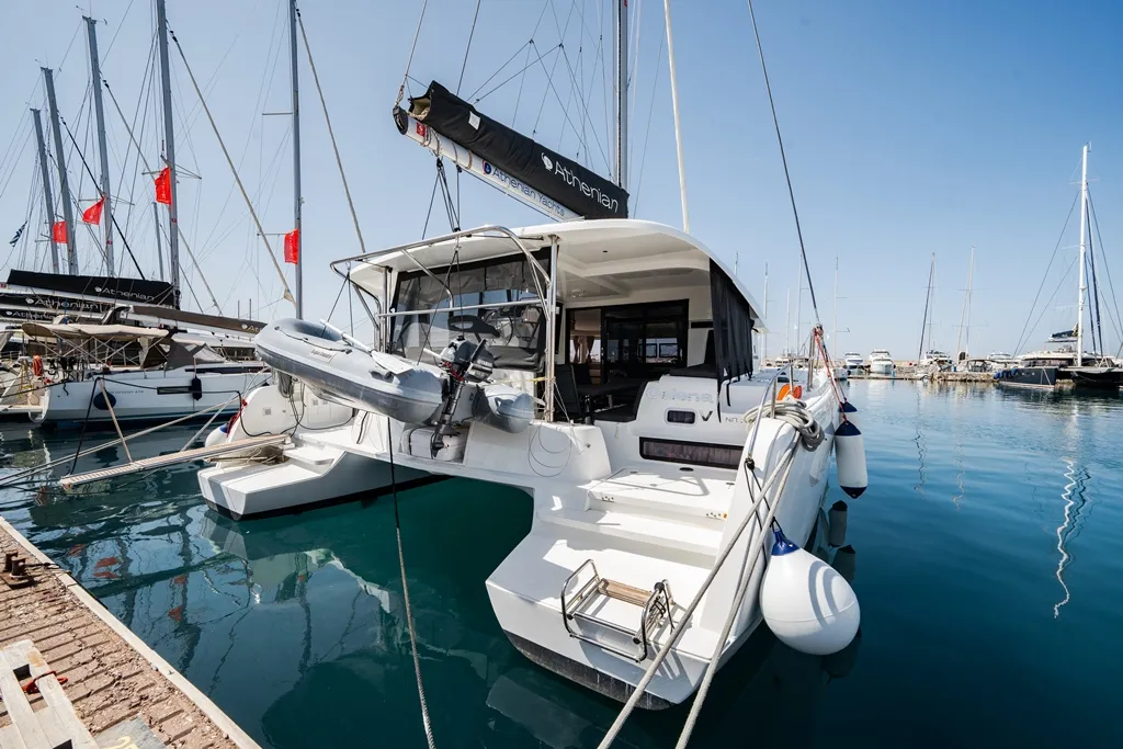 Exterior view of Celena V, a Lagoon 42 catamaran at Benitses, Greece