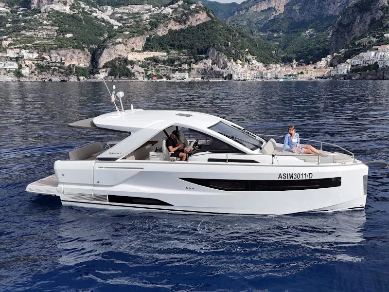Exterior view of The Beginning, a Jeanneau DB/37 motorboat at Pogerola, Italy