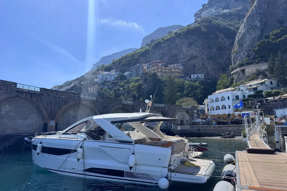 Exterior view of The Beginning, a Jeanneau DB/37 motorboat at Pogerola, Italy