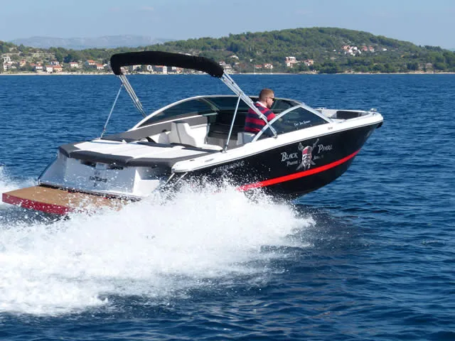 Exterior view of Black Pearl, a Four Winns H210 motorboat at Tribunj, Croatia