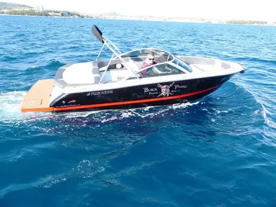Exterior view of Black Pearl, a Four Winns H210 motorboat at Tribunj, Croatia