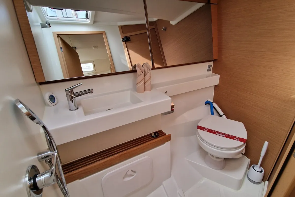 Head on Koala II, a Jeanneau Sun Odyssey 440 sailboat at Sant Antoni de Portmany, Spain