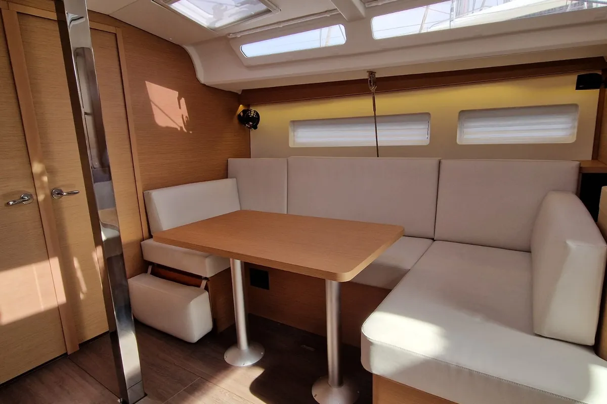 Salon of Koala II, a Jeanneau Sun Odyssey 440 sailboat at Sant Antoni de Portmany, Spain