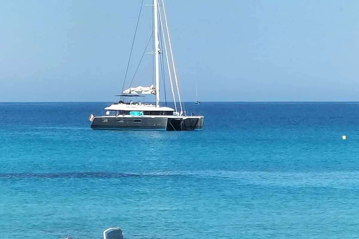 Exterior view of ZS, a Lagoon 620 catamaran at Ibiza, Spain