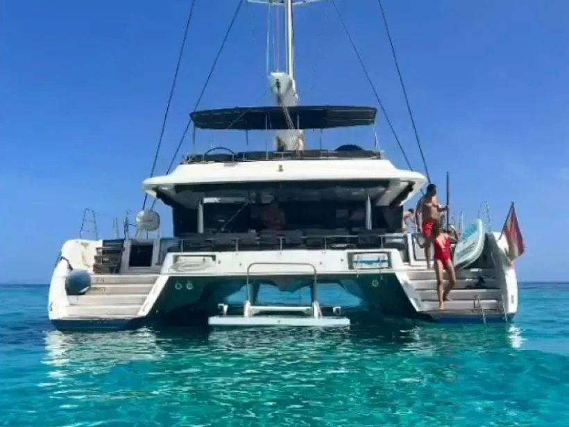 Exterior view of ZS, a Lagoon 620 catamaran at Ibiza, Spain