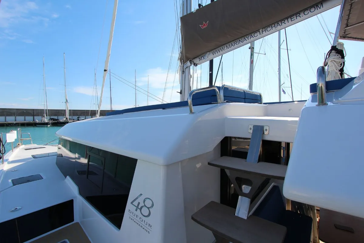 Exterior view of Stella, a Dufour Catamaran 48 catamaran at Olbia, Italy