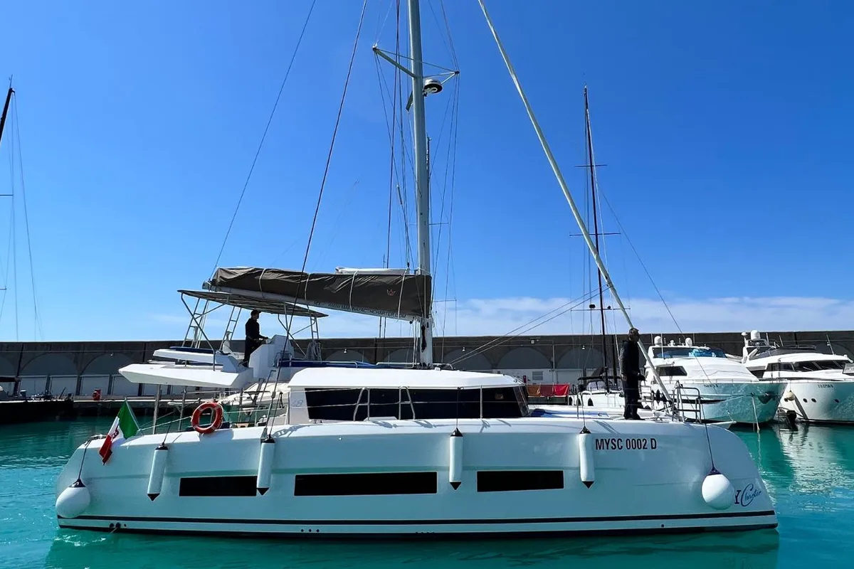 Exterior view of Stella, a Dufour Catamaran 48 catamaran at Olbia, Italy