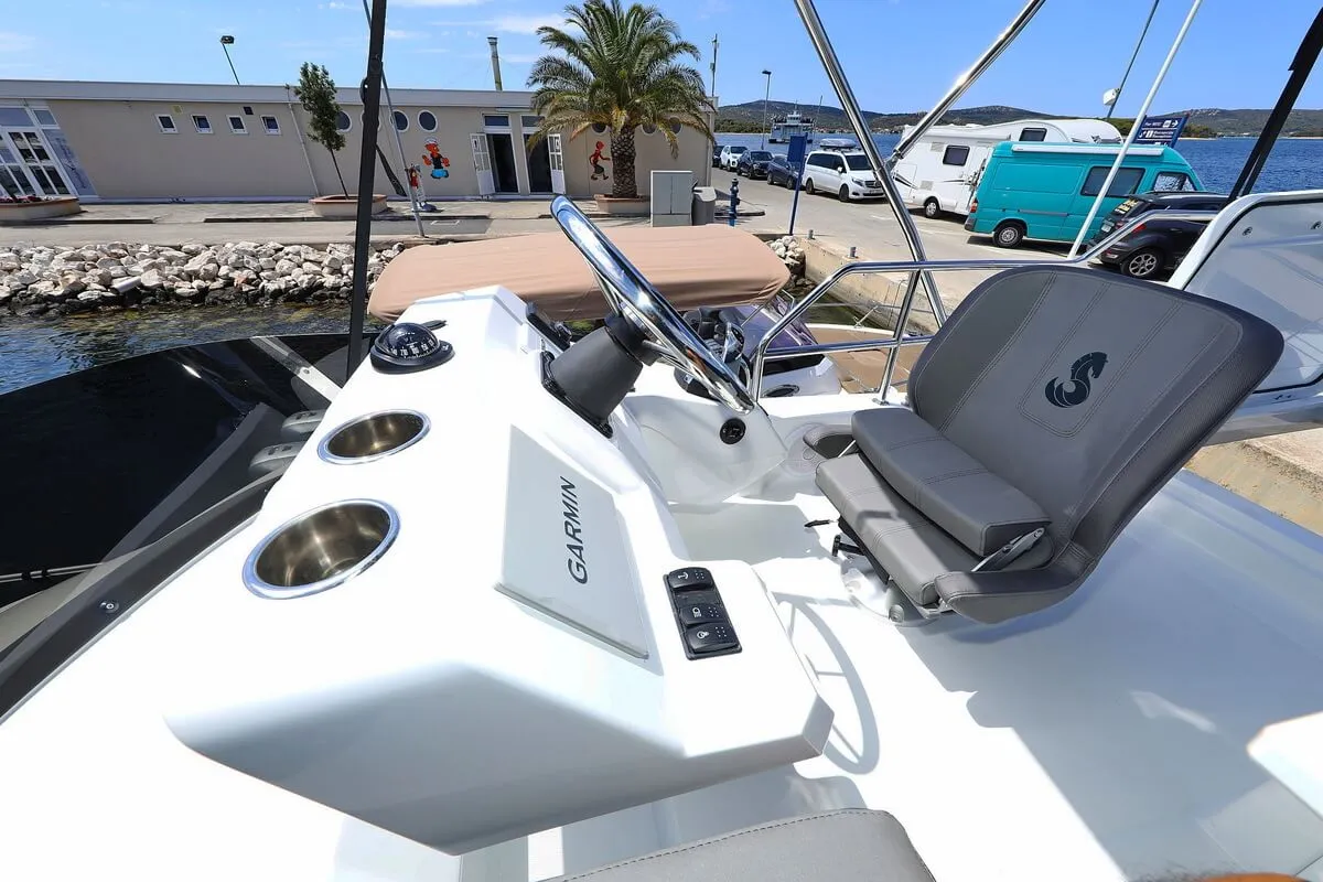 Cockpit of Solis, a Beneteau Antares 11 Fly OB motorboat at Grad Biograd na Moru, Croatia
