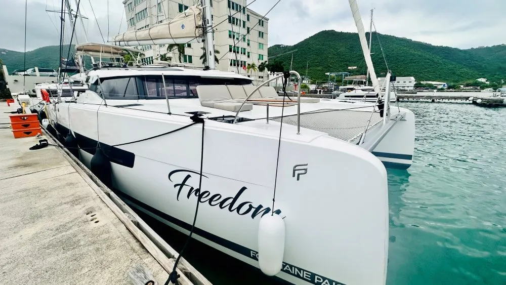 Exterior view of Freedom, a Fountaine Pajot Aura 51 catamaran at Road Town, British Virgin Islands