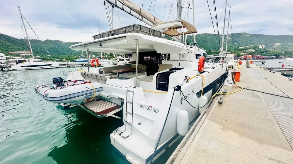 Exterior view of Freedom, a Fountaine Pajot Aura 51 catamaran at Road Town, British Virgin Islands