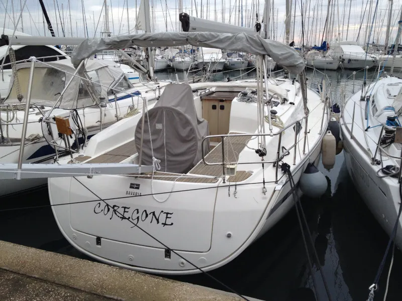 Exterior view of Coregone, a Bavaria 36 Cruiser sailboat at San Vincenzo, Italy