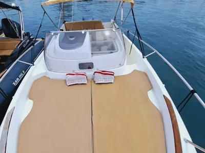 Deck of CORRECAMINOS BEEP BEEP, a Jeanneau Cap Camarat 755WA motorboat at Sant Antoni de Portmany, Spain