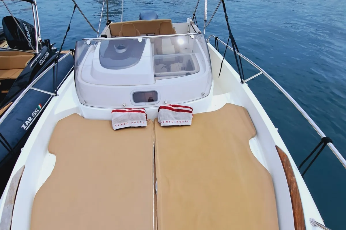 Deck of CORRECAMINOS BEEP BEEP, a Jeanneau Cap Camarat 755WA motorboat at Sant Antoni de Portmany, Spain