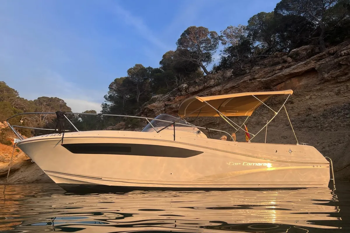Exterior view of CORRECAMINOS BEEP BEEP, a Jeanneau Cap Camarat 755WA motorboat at Sant Antoni de Portmany, Spain